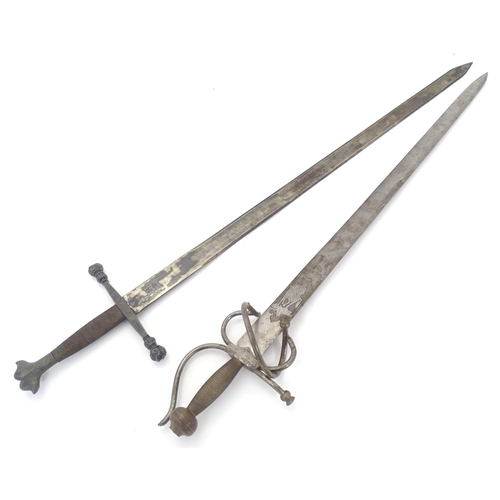 1803 - Militaria / Arms & Armour : two 20thC Spanish swords, comprising a Colada (with 33 3/4