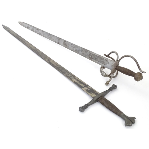 1803 - Militaria / Arms & Armour : two 20thC Spanish swords, comprising a Colada (with 33 3/4