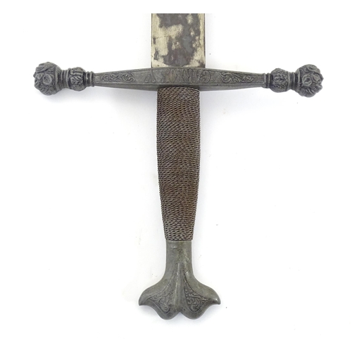 1803 - Militaria / Arms & Armour : two 20thC Spanish swords, comprising a Colada (with 33 3/4