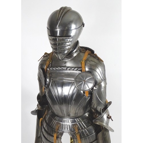 1814 - Militaria: a 20thC medieval style display half suit of armour, constructed from articulated steel pa... 