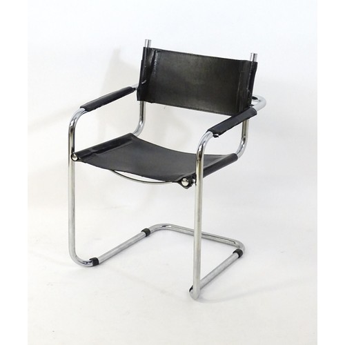 7 - A late 20thC chromed cantilever open armchair. 26