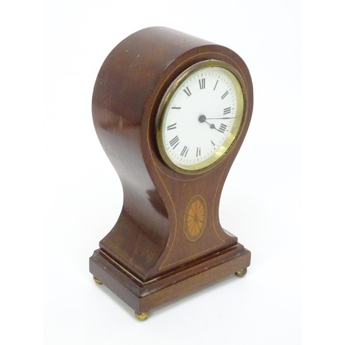 21 - A balloon shaped mantel clock in inlaid case with movement signed R & Co ( Richard & Co) , made in F... 