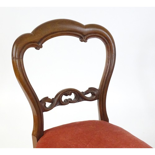 37 - Two 19thC mahogany balloon back chairs, raised on cabriole legs. 19