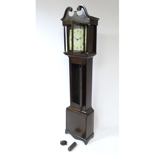 52 - A longcase clock with pained 12