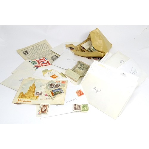 14 - Stamps : A quantity of postage stamps, British Empire and world c.1950 - 1980