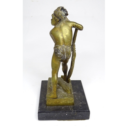 19 - A cast brass tribal figure with a feather headdress, approx 8