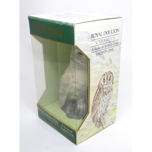 20 - A boxed Royal Doulton Whyte & Mackay scotch whisky figural decanter modelled as a snowy owl. Approx ... 