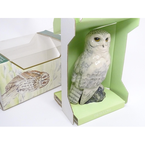 20 - A boxed Royal Doulton Whyte & Mackay scotch whisky figural decanter modelled as a snowy owl. Approx ... 