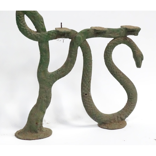 49 - A pair of Coalbrookdale style bench ends with serpent decoration. Each approx 24