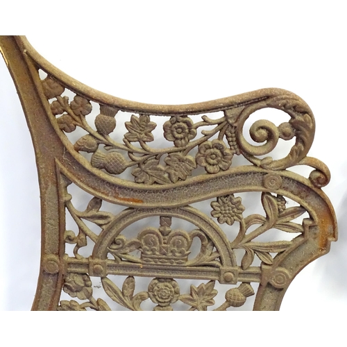 50 - A pair of Coalbrookdale style bench ends with floral and foliate decoration. Approx 31 3/4