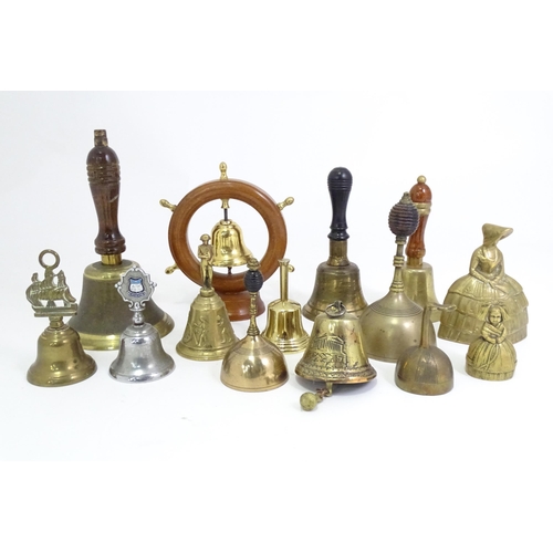 54 - A quantity of assorted Victorian and later bells to include table bells, hand bells etc. The tallest... 