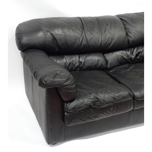 8 - A modern 3-seat sofa in black, approx 84