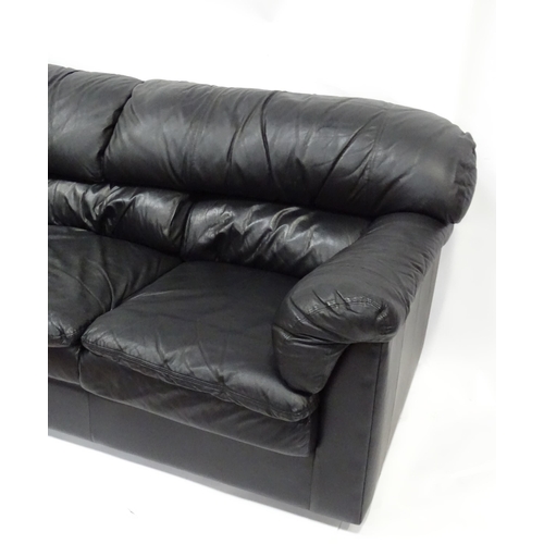 8 - A modern 3-seat sofa in black, approx 84