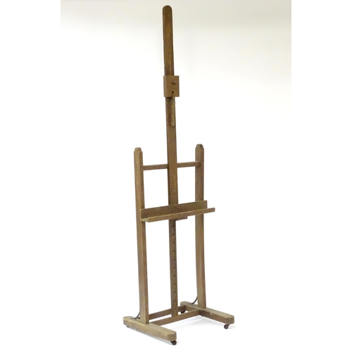 105 - An adjustable artist's easel, marked Bourgeois Aine.