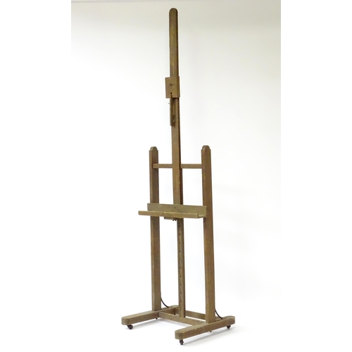 105 - An adjustable artist's easel, marked Bourgeois Aine.