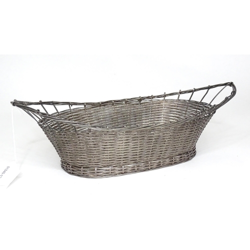 949 - A white metal wirework basket.  Approx 12