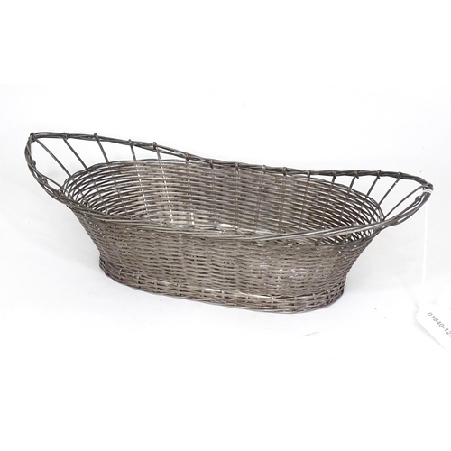 949 - A white metal wirework basket.  Approx 12