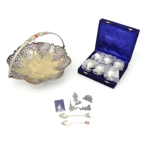 952 - A quantity of assorted items to include silver plate cups (cased). A silver plate basket, a spoon, a... 