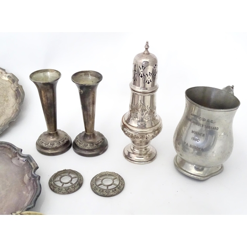 955 - A quantity of assorted silver plated wares to include salvers, caster, mustard pot etc