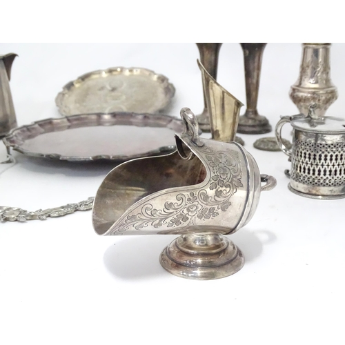 955 - A quantity of assorted silver plated wares to include salvers, caster, mustard pot etc