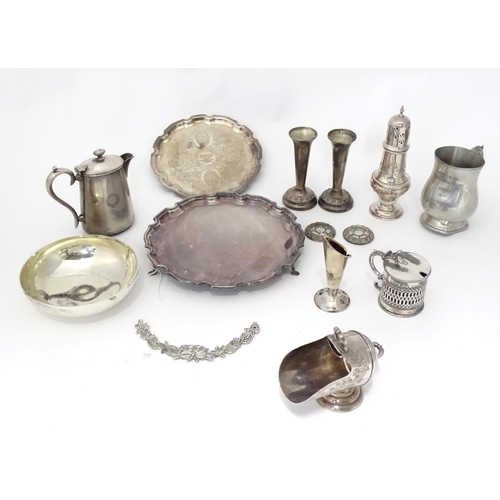 955 - A quantity of assorted silver plated wares to include salvers, caster, mustard pot etc