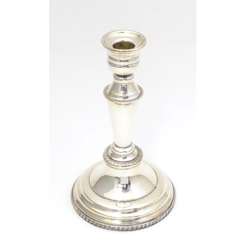 956 - A silver plate candlestick. Approx 8