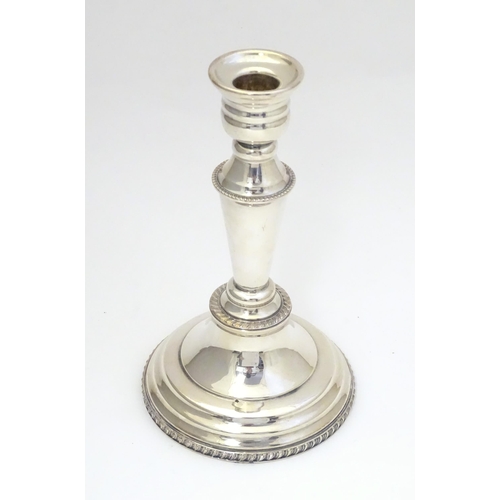 956 - A silver plate candlestick. Approx 8