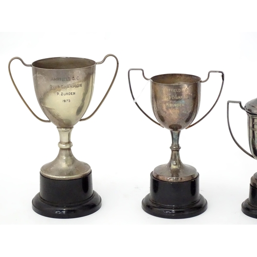 959 - Four silver plate trophy cups, some engraved for Ampfield Golf Club. Tallest 9 1/2