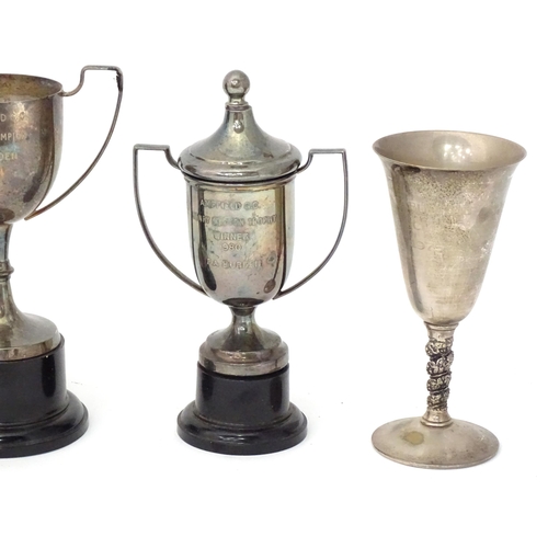 959 - Four silver plate trophy cups, some engraved for Ampfield Golf Club. Tallest 9 1/2