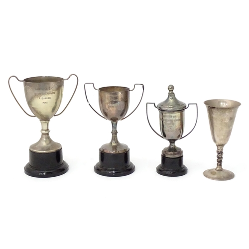 959 - Four silver plate trophy cups, some engraved for Ampfield Golf Club. Tallest 9 1/2