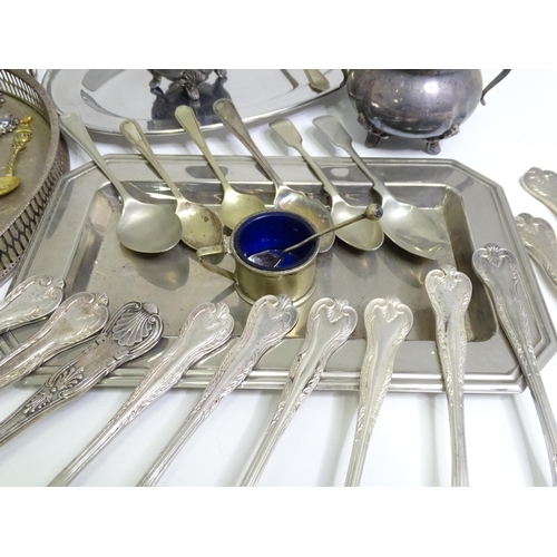 950 - A quantity of assorted silver plated wares to include various trays, flatware, candelabra, milk jug,... 