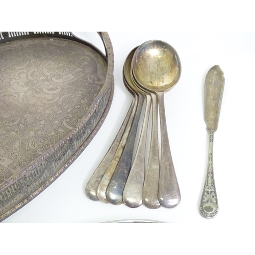 950 - A quantity of assorted silver plated wares to include various trays, flatware, candelabra, milk jug,... 