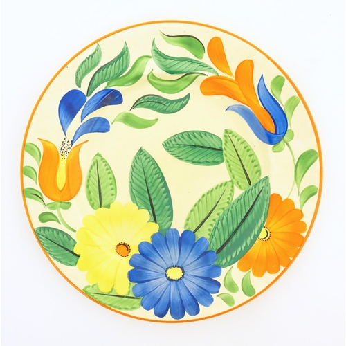 93 - A Gray's Pottery plate with hand painted floral and foliate decoration. Marked under with no. 9349. ... 