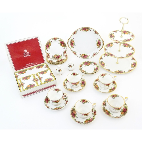 163 - A quantity of Royal Albert tea wares in the Old Country Roses pattern, to include cake plate, tea cu... 