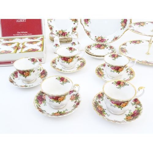 163 - A quantity of Royal Albert tea wares in the Old Country Roses pattern, to include cake plate, tea cu... 