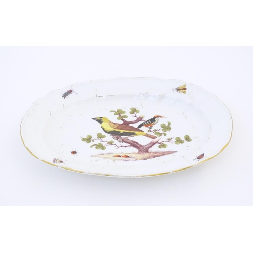 64 - A Meissen style plate of oval form with bird decoration to centre and insect detail to border. Marke... 