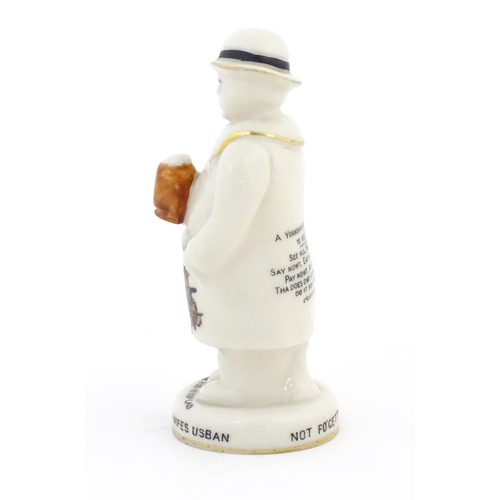 113 - A Carlton China crested ware model of a Yorkshireman, bearing the crest of Sheffield and marked to t... 