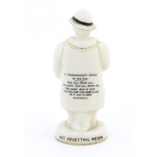 113 - A Carlton China crested ware model of a Yorkshireman, bearing the crest of Sheffield and marked to t... 