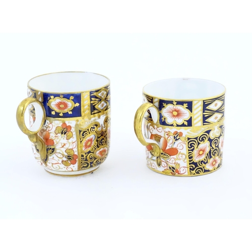 114 - A Royal Crown Derby coffee cup and saucer decorated in the Imari pattern. Marked under no. 2451. Tog... 