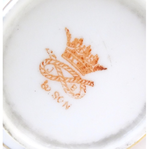 114 - A Royal Crown Derby coffee cup and saucer decorated in the Imari pattern. Marked under no. 2451. Tog... 