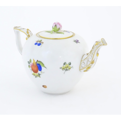 116 - A Herend pottery teapot decorated in the pattern Fruits & Flowers, with gilt highlights and a rose b... 