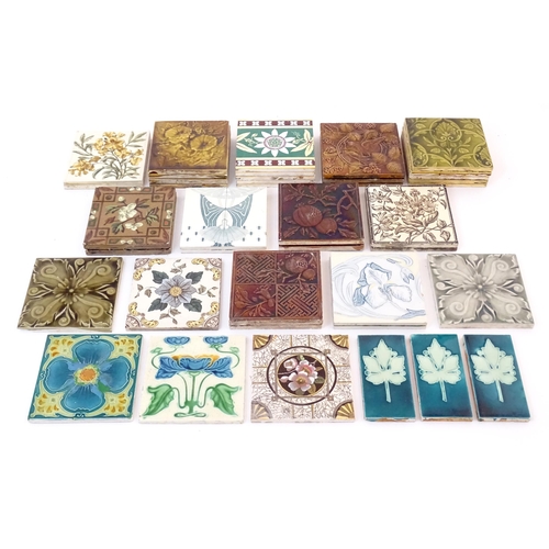 125 - A quantity of Victorian and later tiles to include floral and foliate designs, passion flowers, pome... 