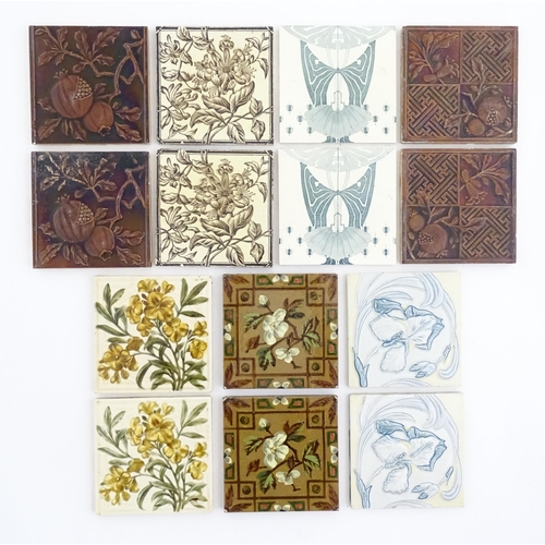 125 - A quantity of Victorian and later tiles to include floral and foliate designs, passion flowers, pome... 