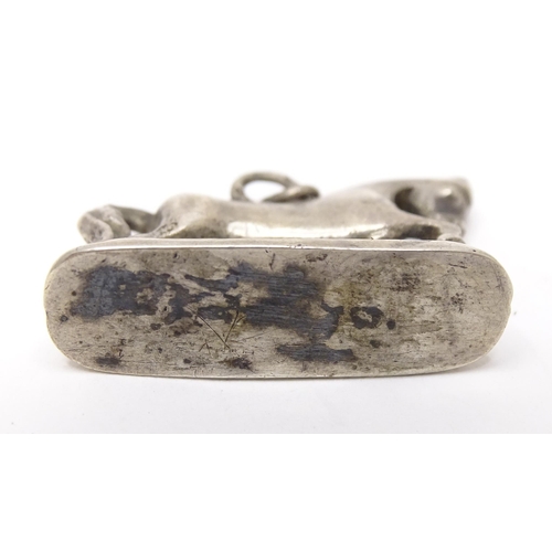 667 - A silver fob / pendant charm modelled as a horse. Approx 3/4