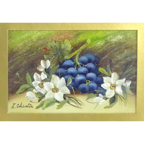 1834 - Evelyn Chester (1875-1929), Oil on board, A still life study with white flowers and grapes in a hedg... 