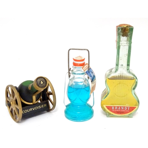 1061 - Spirits / Liqueurs etc.: A quantity of assorted novelty miniature bottles to include examples for Wi... 