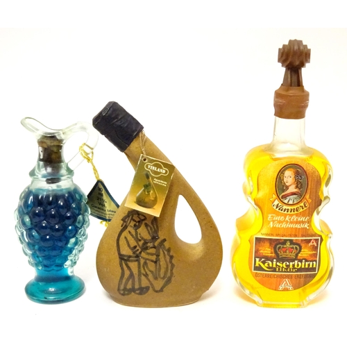 1061 - Spirits / Liqueurs etc.: A quantity of assorted novelty miniature bottles to include examples for Wi... 