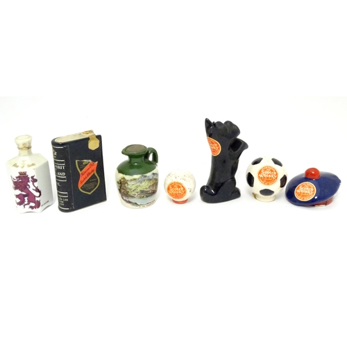 1061 - Spirits / Liqueurs etc.: A quantity of assorted novelty miniature bottles to include examples for Wi... 