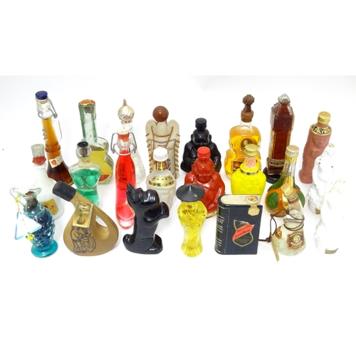 1061 - Spirits / Liqueurs etc.: A quantity of assorted novelty miniature bottles to include examples for Wi... 