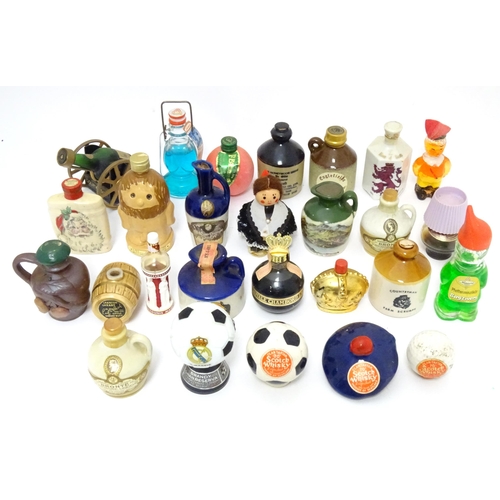 1061 - Spirits / Liqueurs etc.: A quantity of assorted novelty miniature bottles to include examples for Wi... 